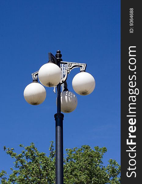 Street lantern in blue sky background