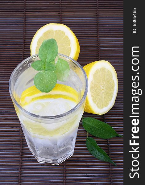 Glass of clean fresh water with lemon