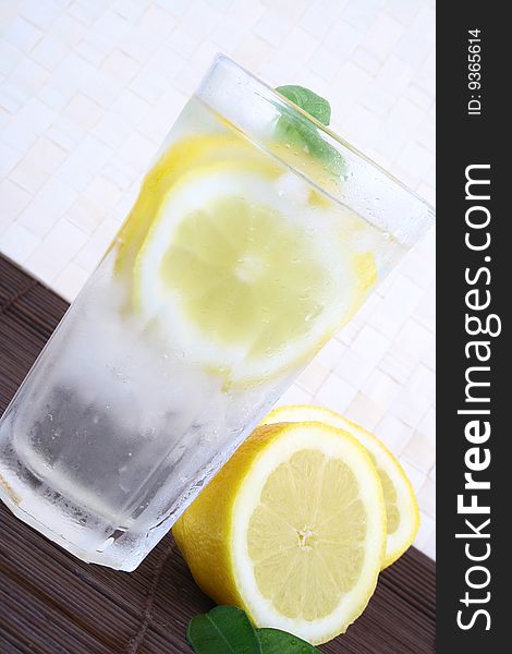 Glass of clean fresh water with lemon