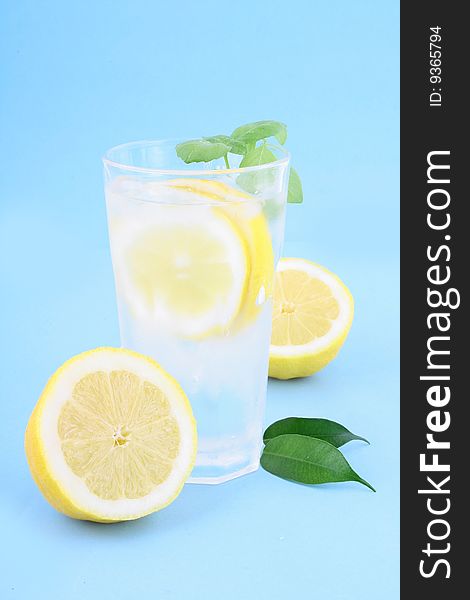 Glass of clean fresh water with lemon