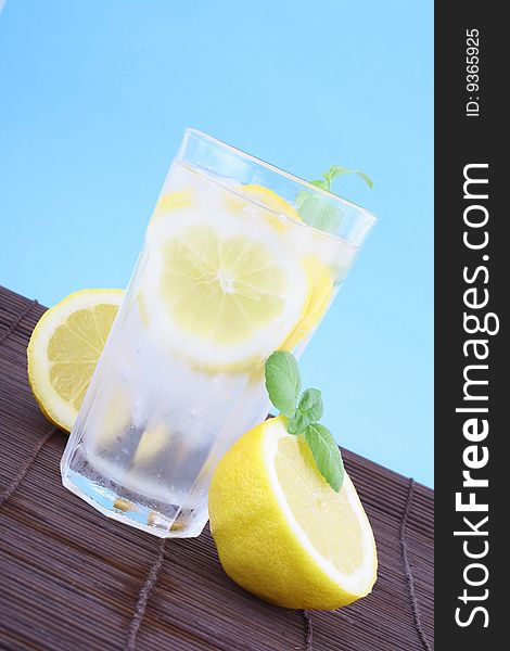 Glass of clean fresh water with lemon