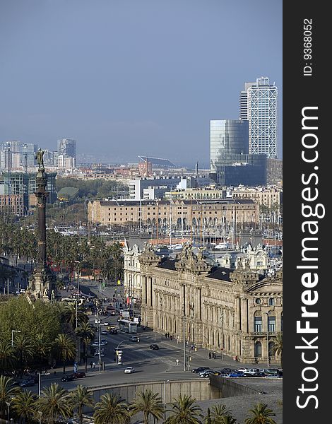 Columbus Monument and the skyline of Barcelona. Columbus Monument and the skyline of Barcelona