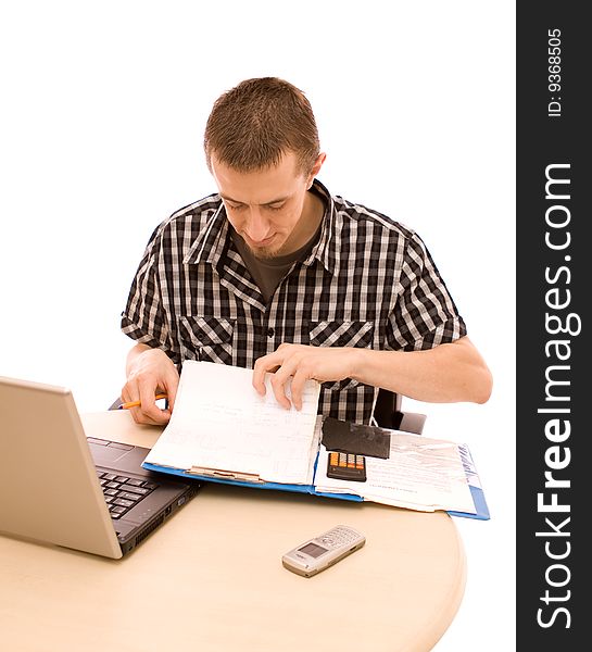 Man with phone working in office