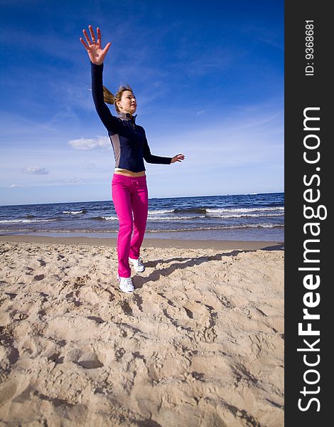 Active woman running on the beach. Active woman running on the beach