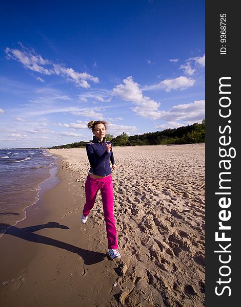 Active woman on the beach