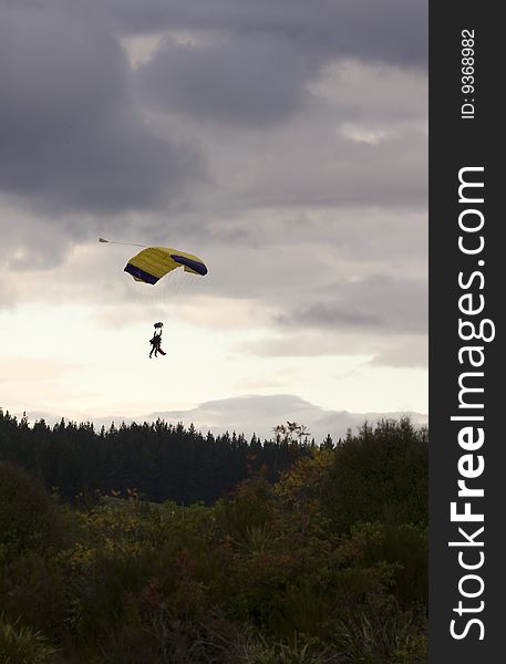 Tandem Paragliders Descending