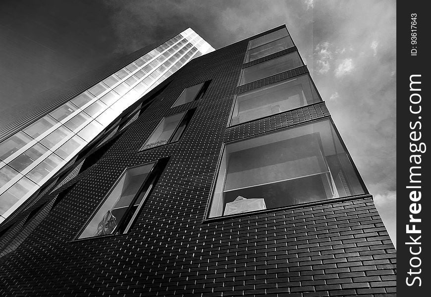 Exterior of modern high rise buildings in black and white.