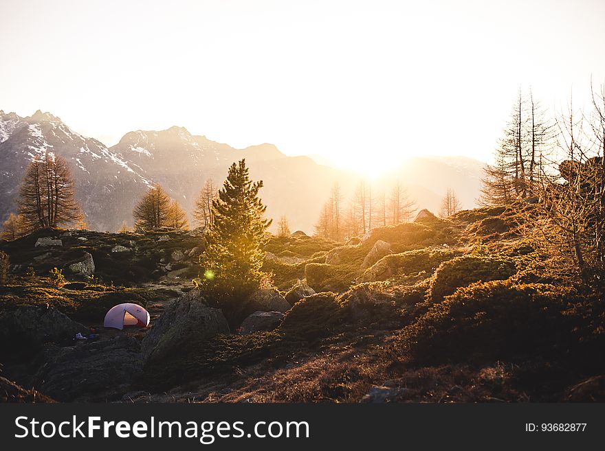 A scenic view on the mountains with the morning sun. A scenic view on the mountains with the morning sun.