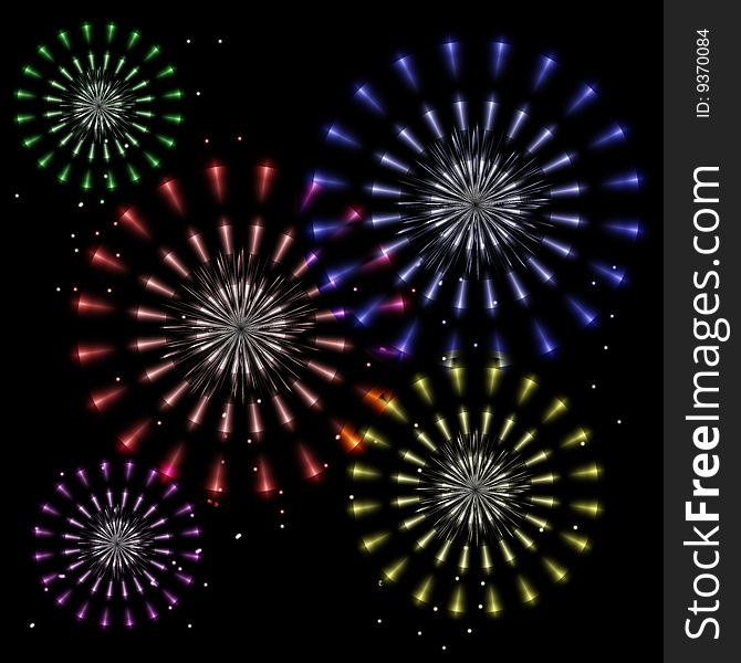 Colorful fireworks explode in flower shapes in a night sky. Colorful fireworks explode in flower shapes in a night sky.