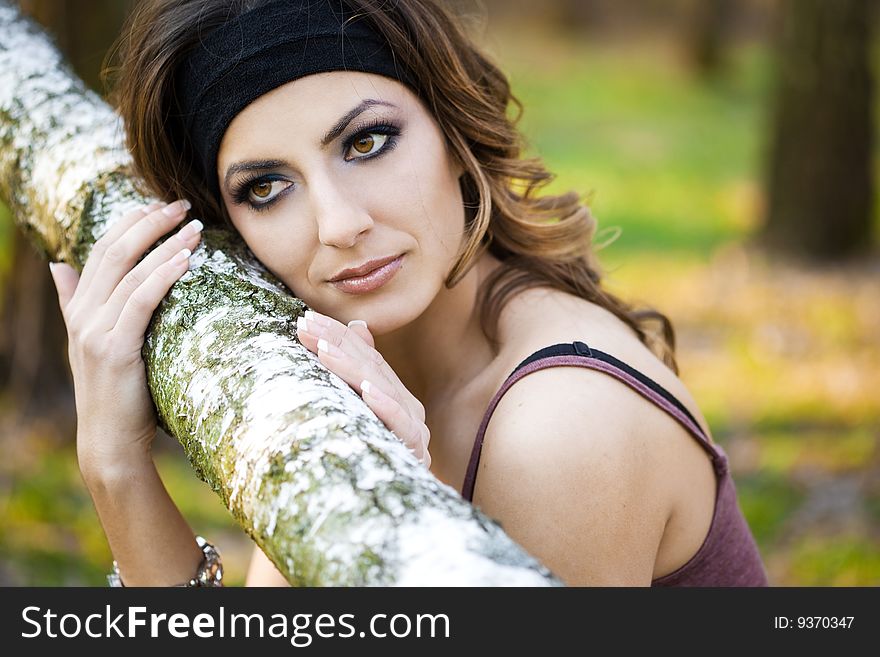 Beautiful girl in a birchwood