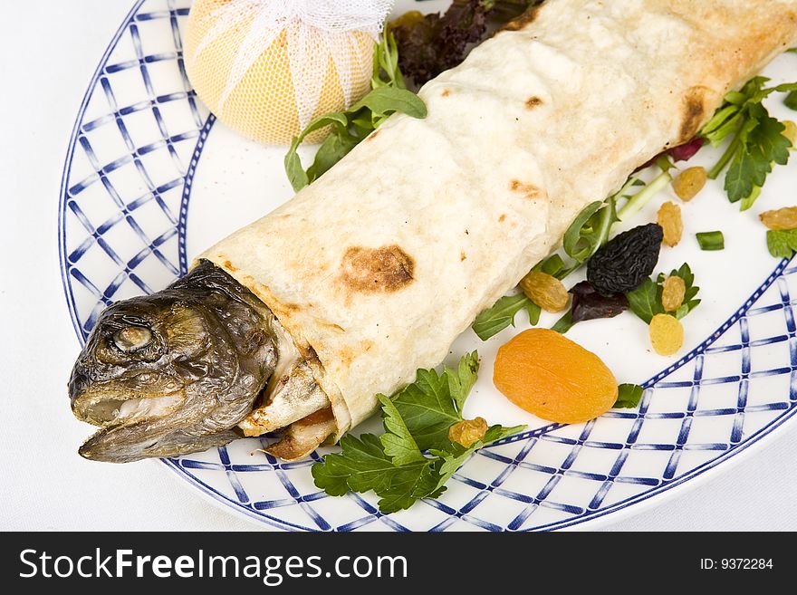 Fish trout in lavash to fry