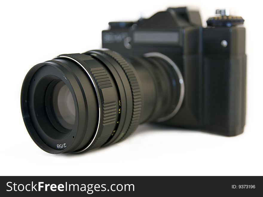 Old slr camera on a white background