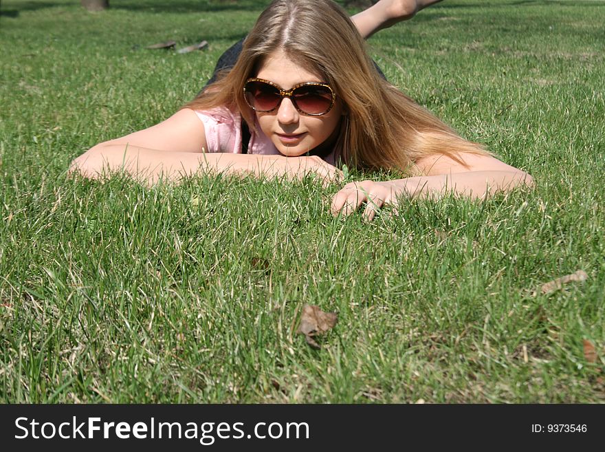 Girl Lying On Grass