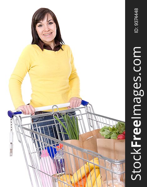 Brunette woman with shopping cart. over white background