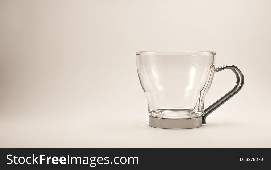 Glass cup on white surface