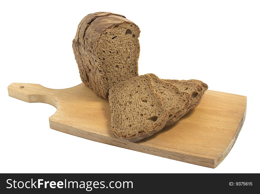Dark bread on chopping board isolated on white