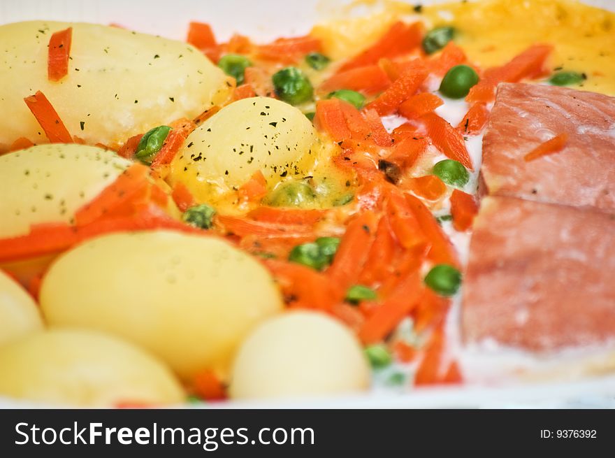 Luxurious potatoes and salmon meal close-up. Luxurious potatoes and salmon meal close-up