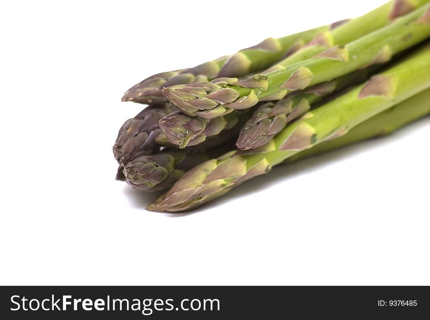 Photo of fresh uncooked asparagus. Photo of fresh uncooked asparagus