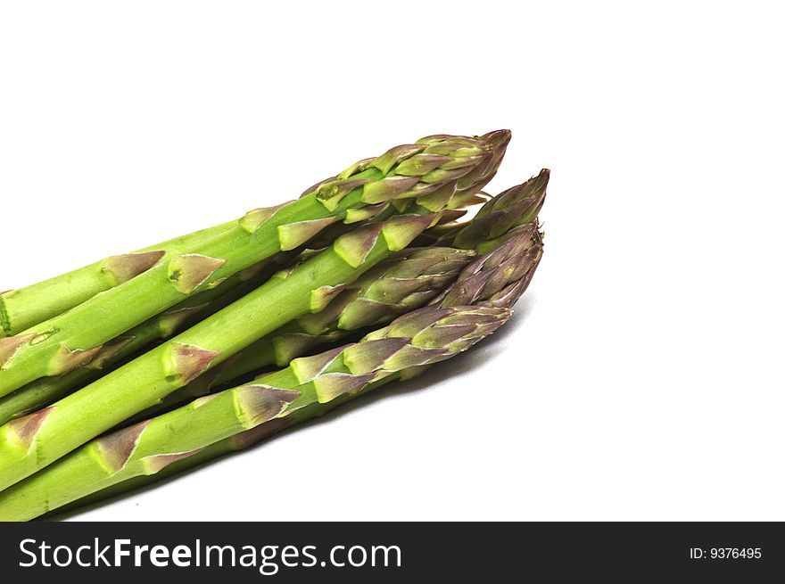 Photo of fresh uncooked asparagus. Photo of fresh uncooked asparagus