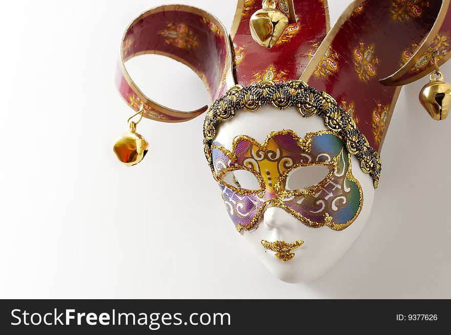 Venetian mask on a white background. Studio shoot. Venetian mask on a white background. Studio shoot.