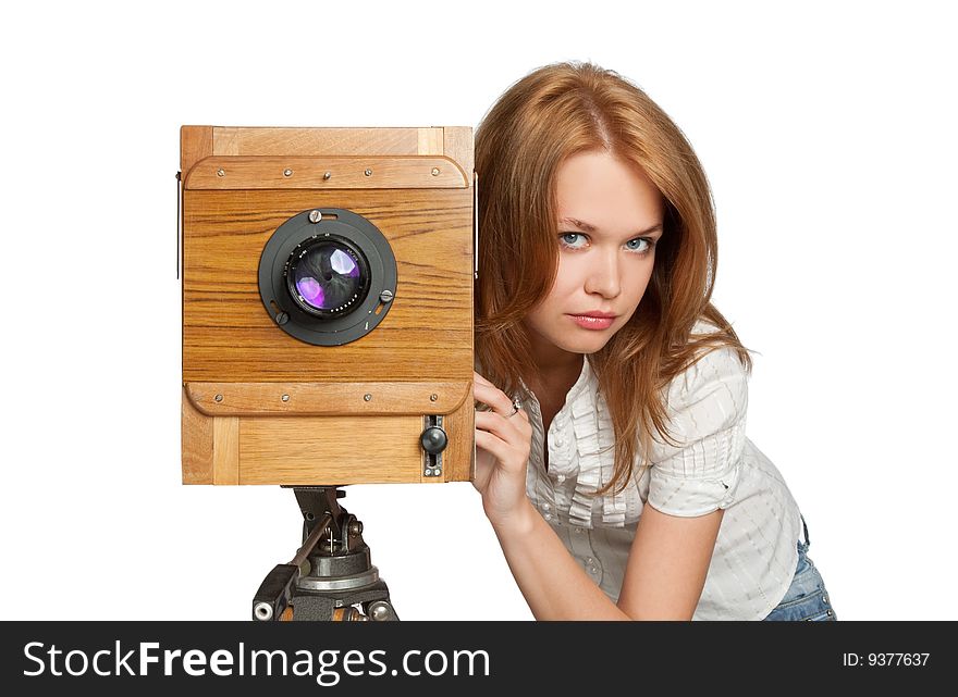 Woman posing with vintage camera  isolated over white
