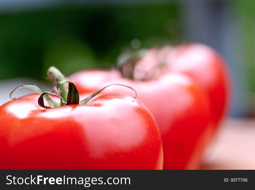 Ripe Beef Tomatoes On The Wooden Background