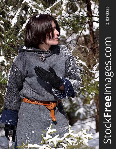 Girl in gray dress and snow tree. Girl in gray dress and snow tree