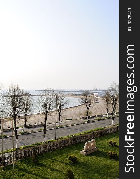 White statue looking at sea