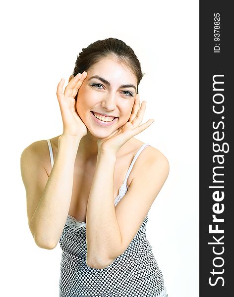 Portrait of a beautiful young surprised woman closing her face with hands. Portrait of a beautiful young surprised woman closing her face with hands