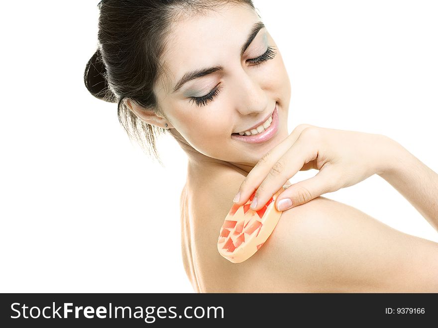 Woman washing her body with soap