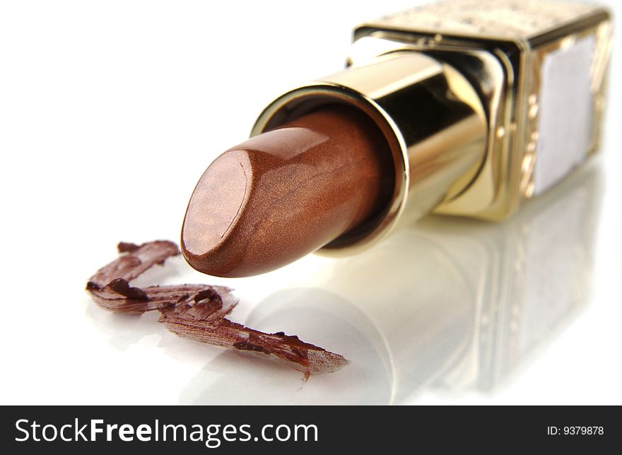Brown lipstick bright isolated on white background. Brown lipstick bright isolated on white background