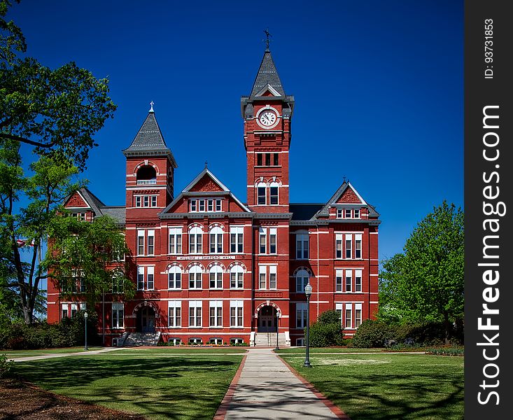 Red Building With Clock Tower