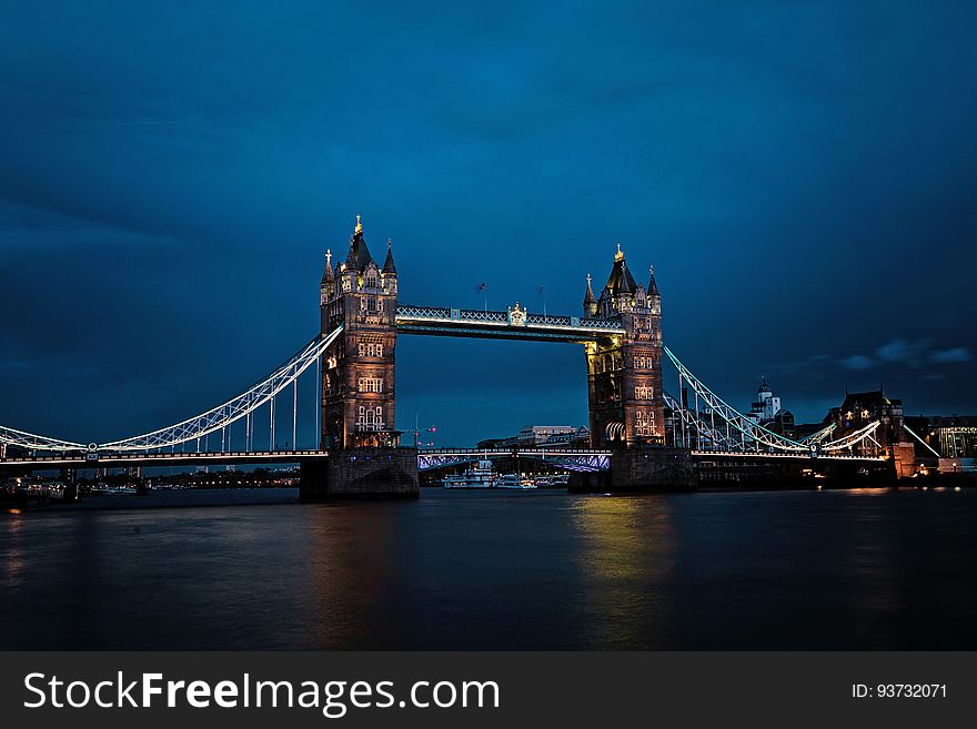 London Bridge reflecting in the River Thames at night. London Bridge reflecting in the River Thames at night.