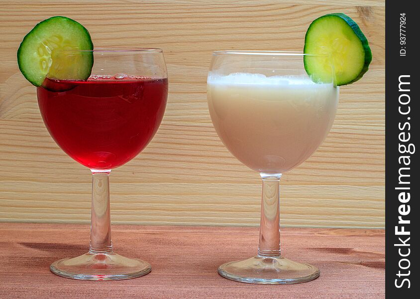 Wine and milk on a wooden background