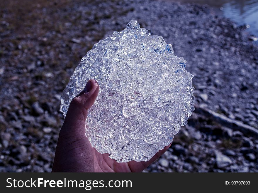 Hand with frozen ice crystals