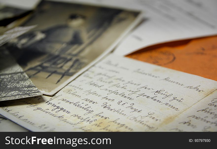 A table with old letters and photos.