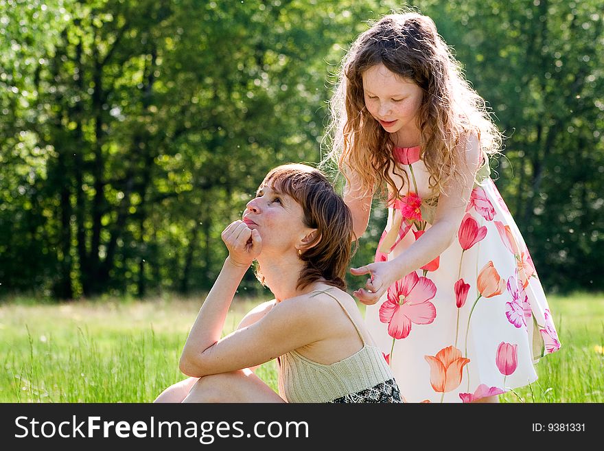Mother and daughter have a happy time together. Mother and daughter have a happy time together