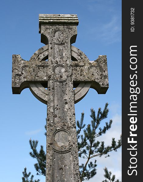 Celtic cross and the sky as a background. Celtic cross and the sky as a background