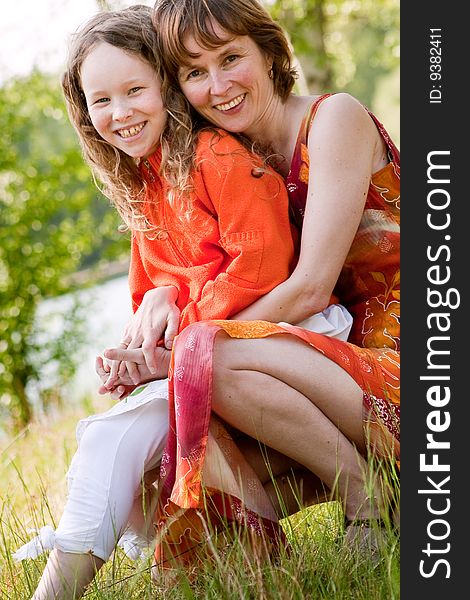 Mother and daughter have a happy time together. Mother and daughter have a happy time together