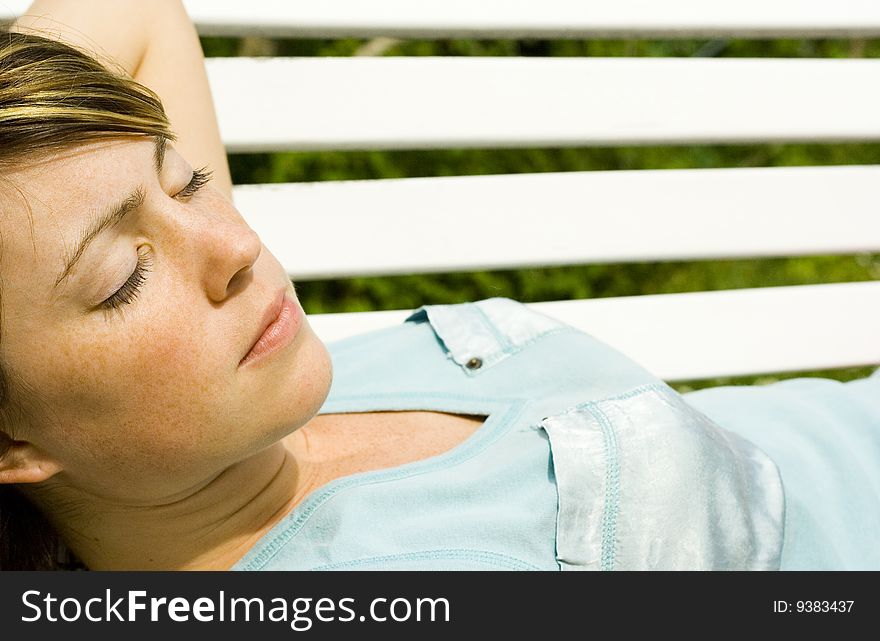 Beautiful woman relaxing in park