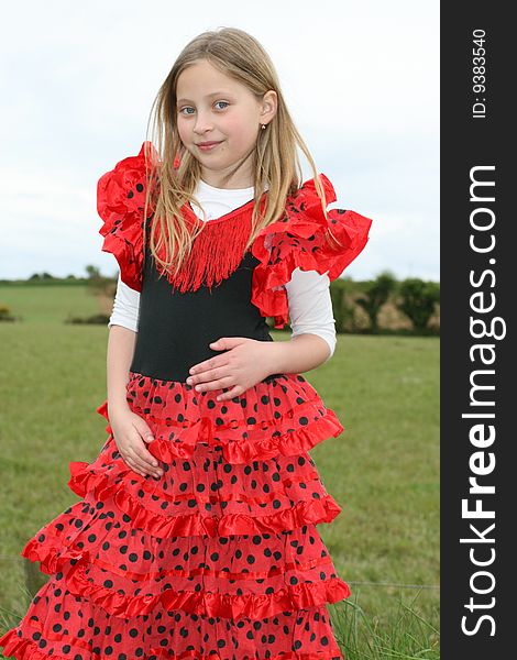 Girl in the red dress on the irish farm. Girl in the red dress on the irish farm