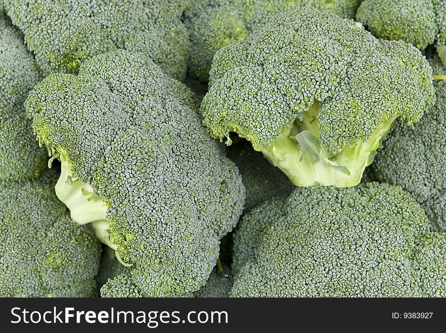 Close up on some broccoli for sale.