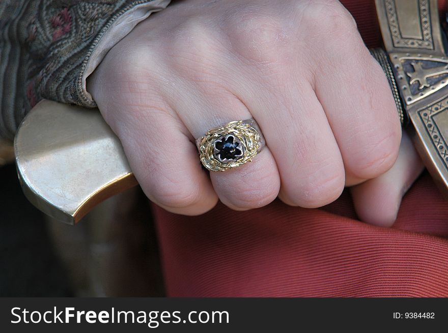 Hand of a man who hold the sword. Hand of a man who hold the sword