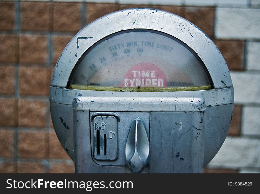 Retro parking meter with expired sign. Retro parking meter with expired sign.