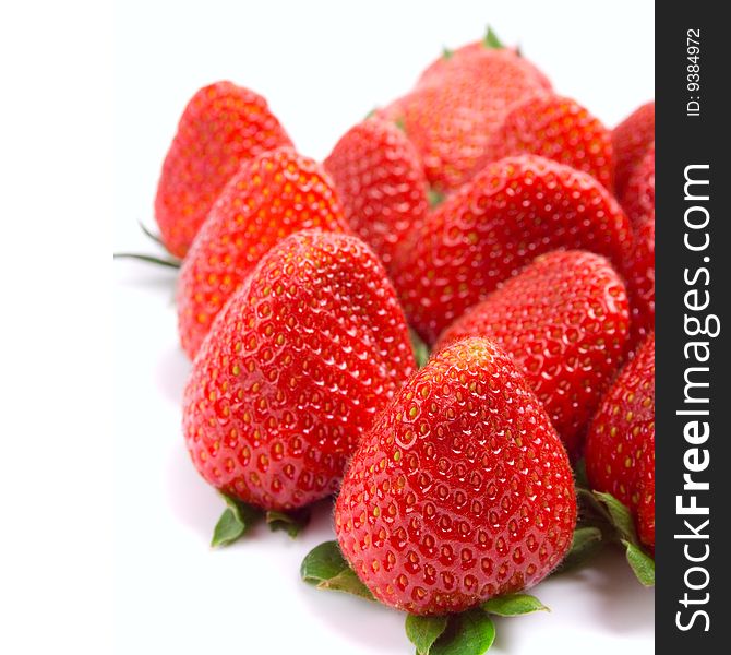 Fresh strawberries closeup on white background