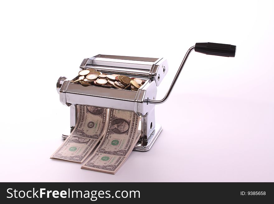 Pasta machine converts Eurro coins into dollar banknotes against a white background with copy-space. Pasta machine converts Eurro coins into dollar banknotes against a white background with copy-space