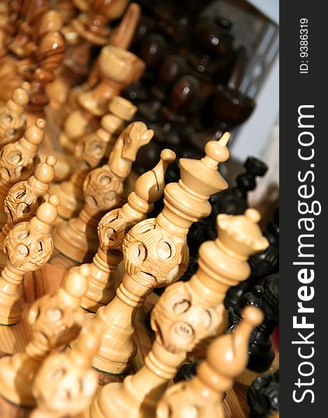 Wooden chess pieces on the table