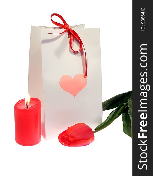 Packing box for a gift, tulip candle and isolated on a white background. Packing box for a gift, tulip candle and isolated on a white background