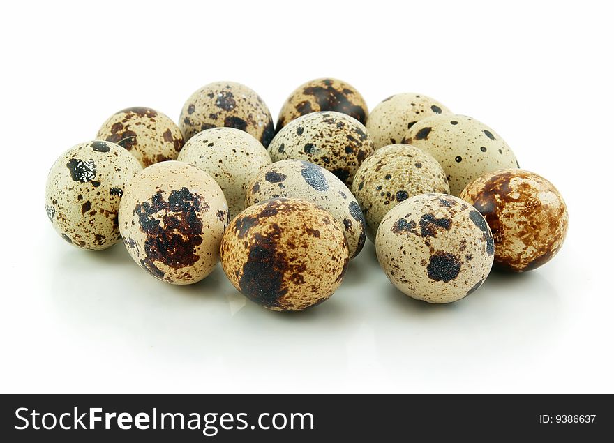 Group of Raw Quail Eggs Isolated on White Background