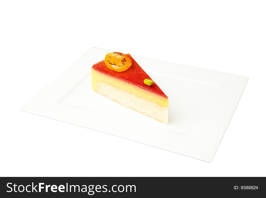 Cheesecake with nut on white plate